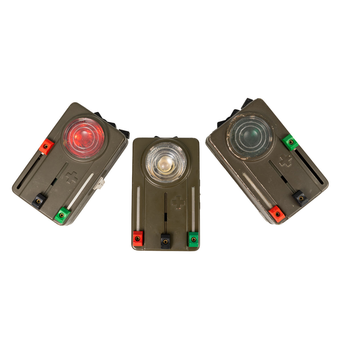 Top-down view of three Swiss Army military torches showing distinct red, green, and clear signalling filter configurations.