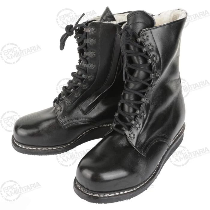 Pair view of German winter pilots boots displaying full leather upper and speed hooks