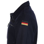 Detail view of German flag emblem patch on navy blue jacket shoulder