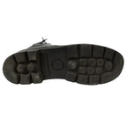 Underside of the standard lugged rubber sole on an original Austrian Army combat boot showing circular traction pattern.