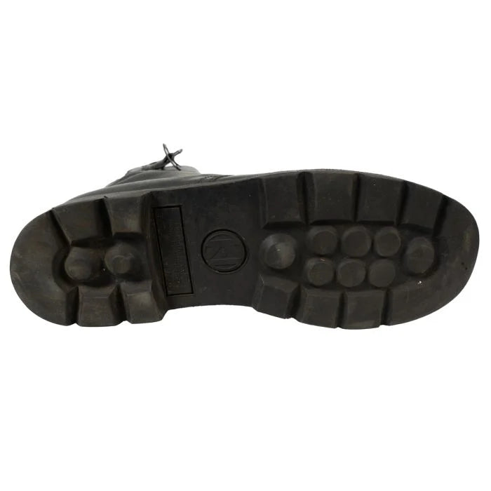 Underside of the standard lugged rubber sole on an original Austrian Army combat boot showing circular traction pattern.