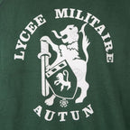 Close-up of white Lycée Militaire Autun emblem print on back of jumper