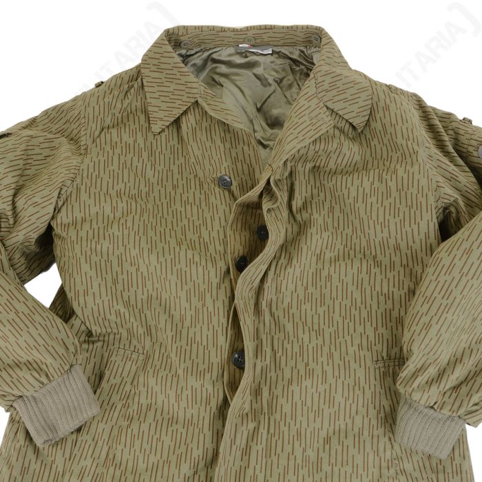 Front view of unbuttoned East German Strichtarn jacket showing button fly and inner lining
