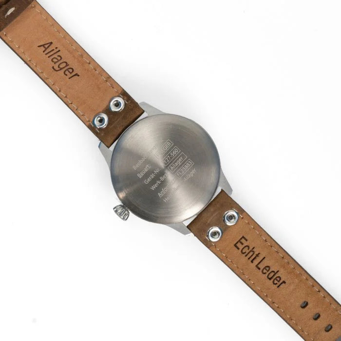 Case back engraving showing Fl.23883 military navigation markings and Echt Leder stamped leather strap
