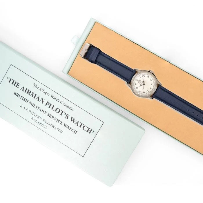British RAF pilot watch displayed inside duck-egg green box with yellow felt lining