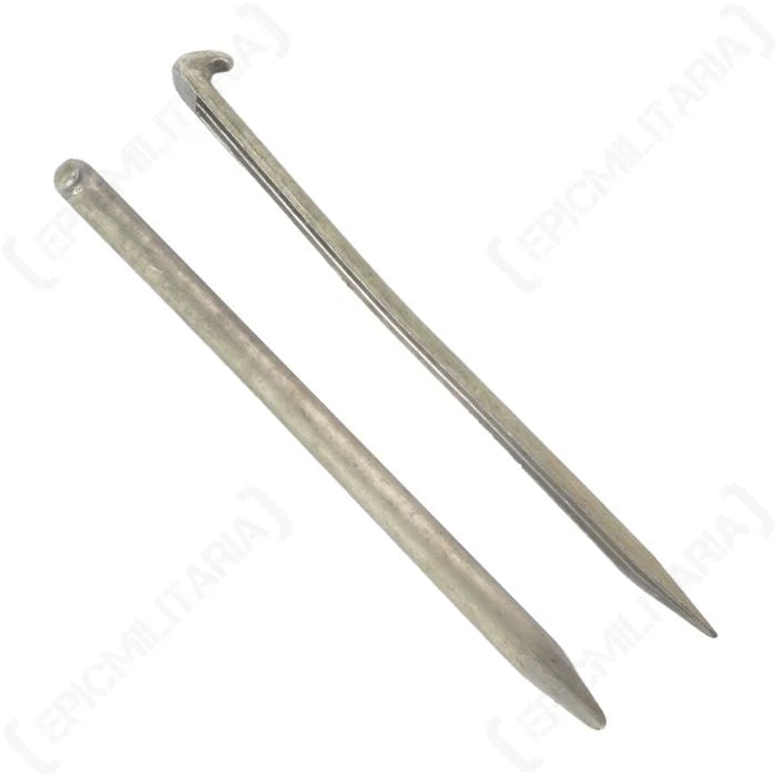 One original German Army 25cm aluminium tent pole segment next to a classic hooked metal tent peg