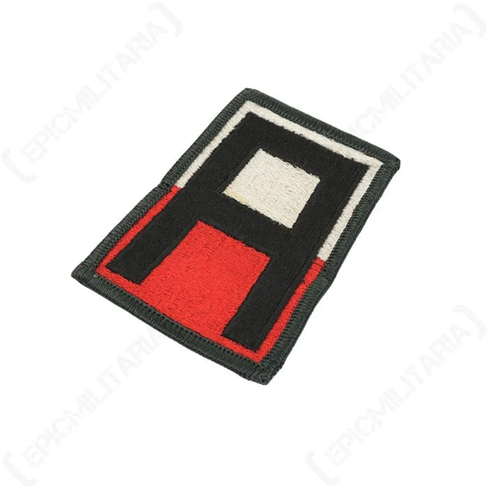 Close-up angle of embroidered US First Army shoulder sleeve insignia