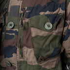 Close-up of the Canadian slot buttons, zip pocket, and velcro patch on the French FELIN jacket