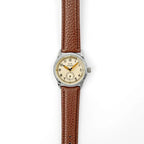 Full lay-flat front view of German Kriegsmarine wrist watch and brown strap