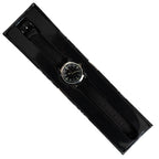 The 1950s British RAF military watch resting inside its sleek black presentation display box.