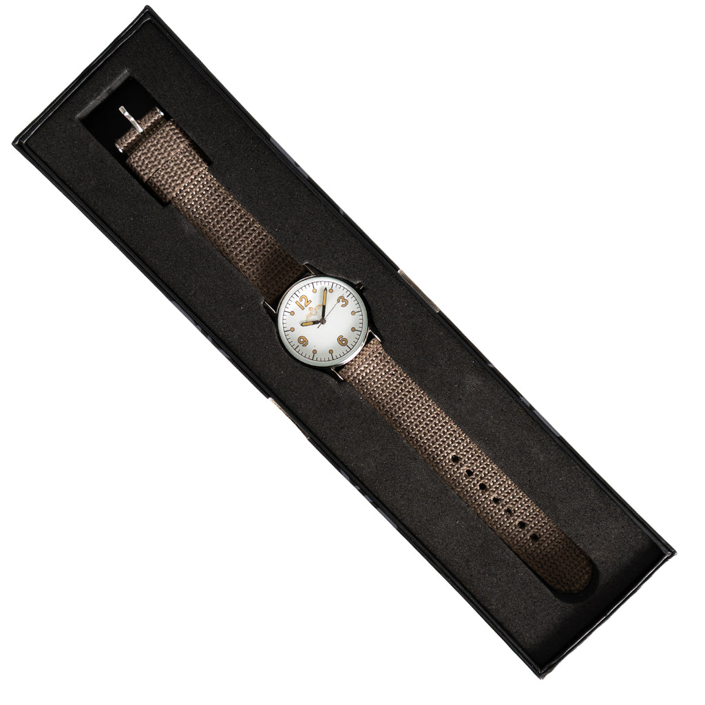 Eaglemoss 1940s Canadian pilot watch resting securely inside its black presentation box, angled view.