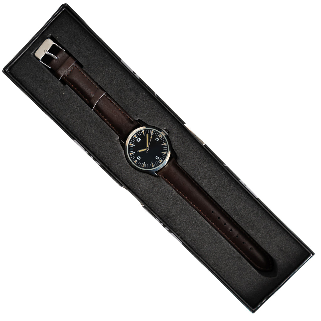 Eaglemoss 1960s Pakistani Airman watch presented in its original collector's box, featuring a slim silver case and leather strap.
