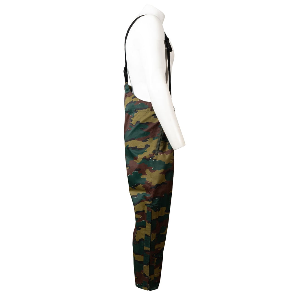 Side profile view showing waterproof Gore-Tex trousers on mannequin with leg zipper access.