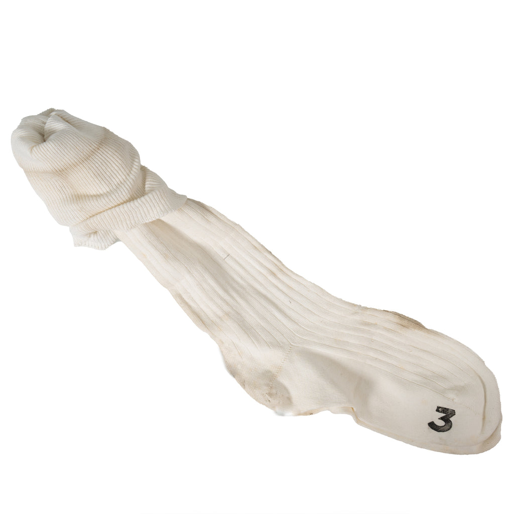 Side angle of a British Navy knee high sock showing ribbed texture and the reinforced heel area with a numeral 3.