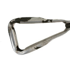 Close-up detail of the durable, triangular metal handle of the Dutch army entrenching tool with worn military finish.