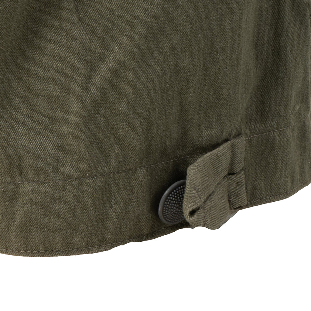 Close-up view of the adjustable buttoned cuff on the leg of the East German NVA field trousers for a secure, custom fit.