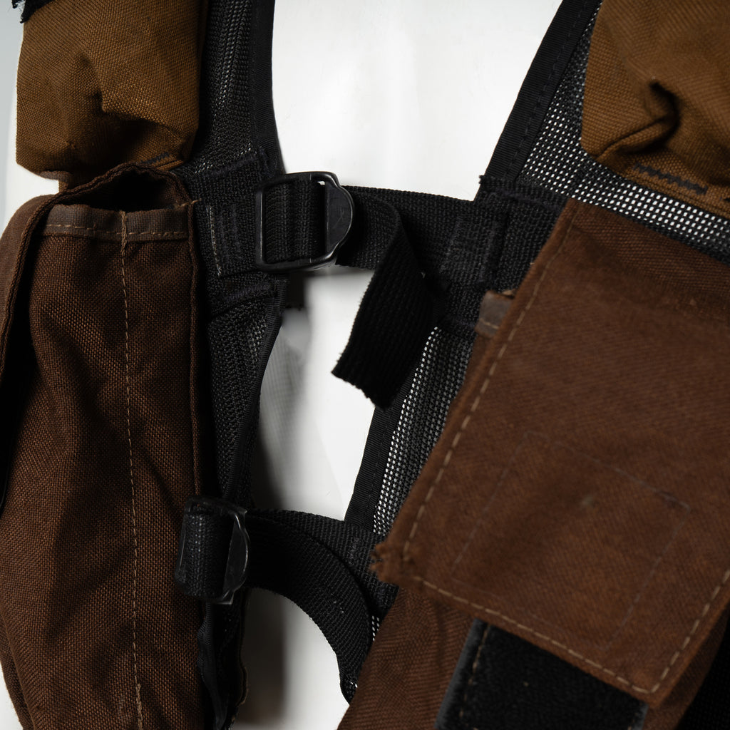 Detail of the center chest straps and black mesh backing on a Pattern 83 combat vest, illustrating the adjustable fit system and breathable tactical design.