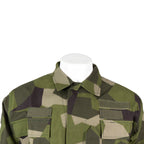 Close-up detail of the collar and upper chest area of the unissued Swedish M90 field shirt showing quality stitching.