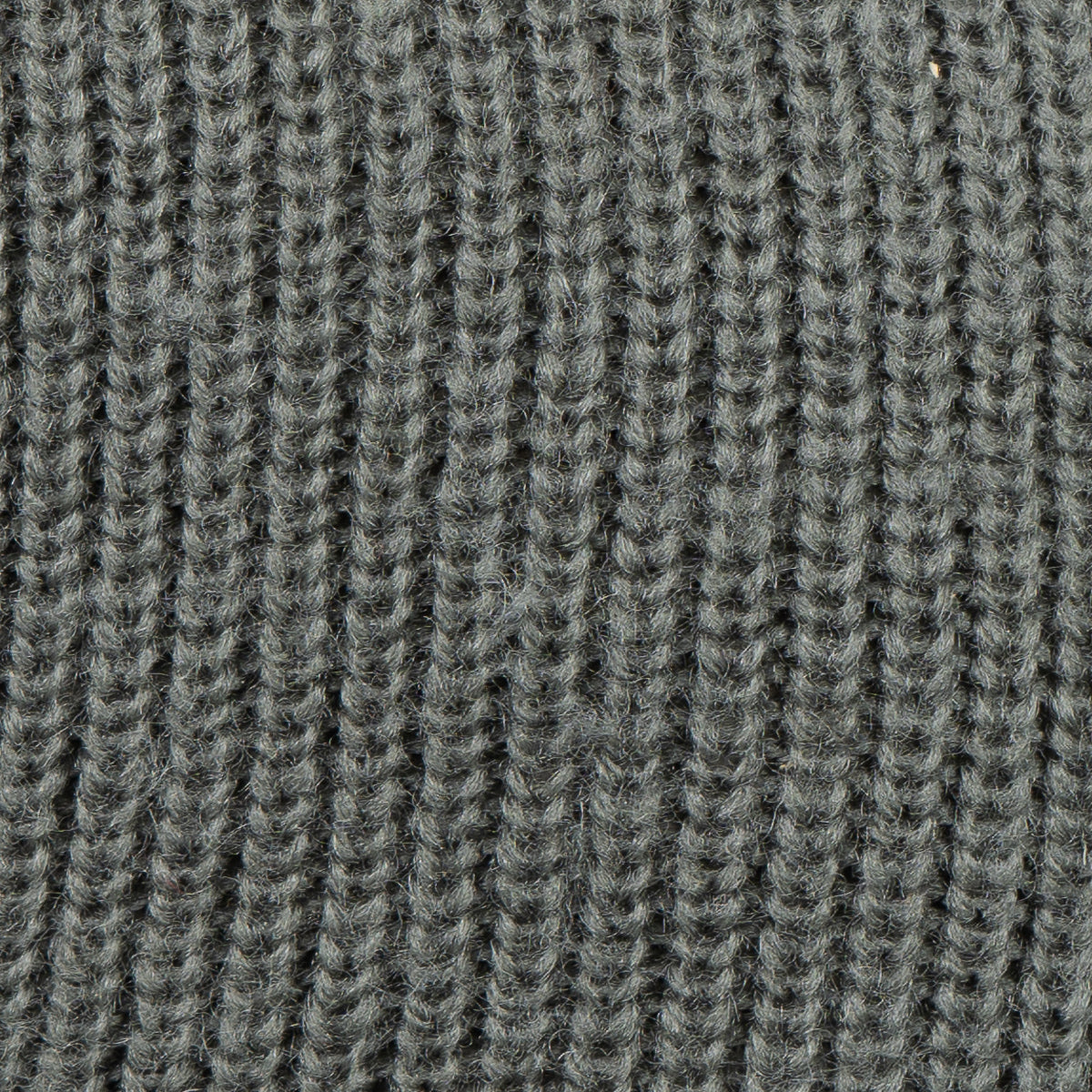Close-up detail of the warm wool blend fabric texture of the original Swiss military balaclava, showing the ribbed knit pattern.