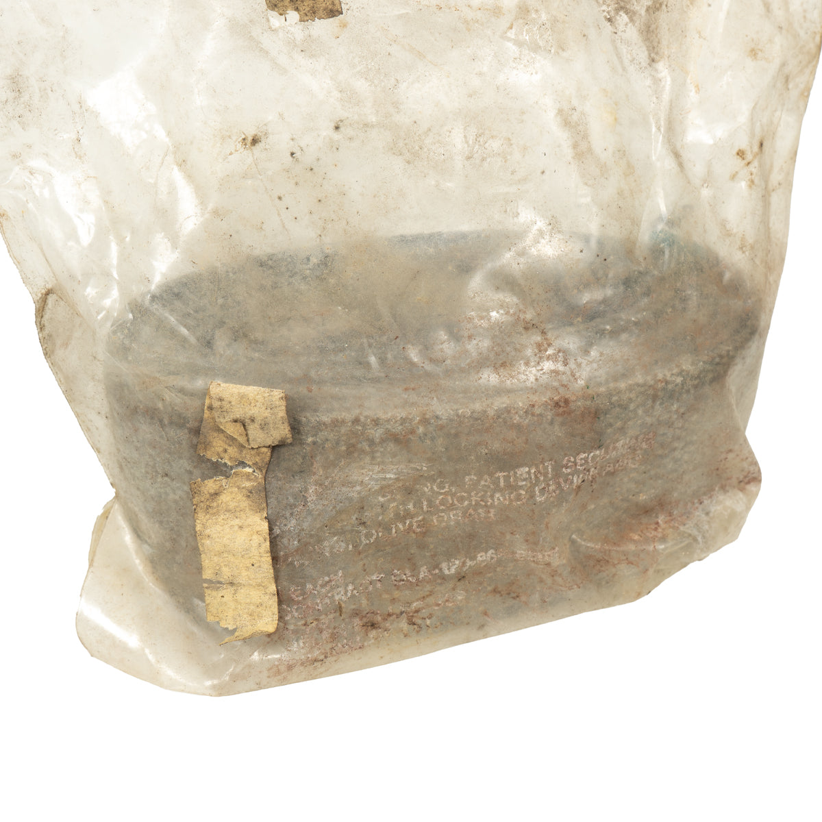 Utility strap in plastic bag