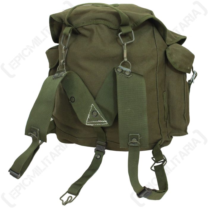Rear view of olive green Bundeswehr rucksack showing attached carrying harness and adjustable shoulder straps