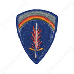 Reverse side of the US Army Europe shoulder patch displaying white bobbin threading and textile back.