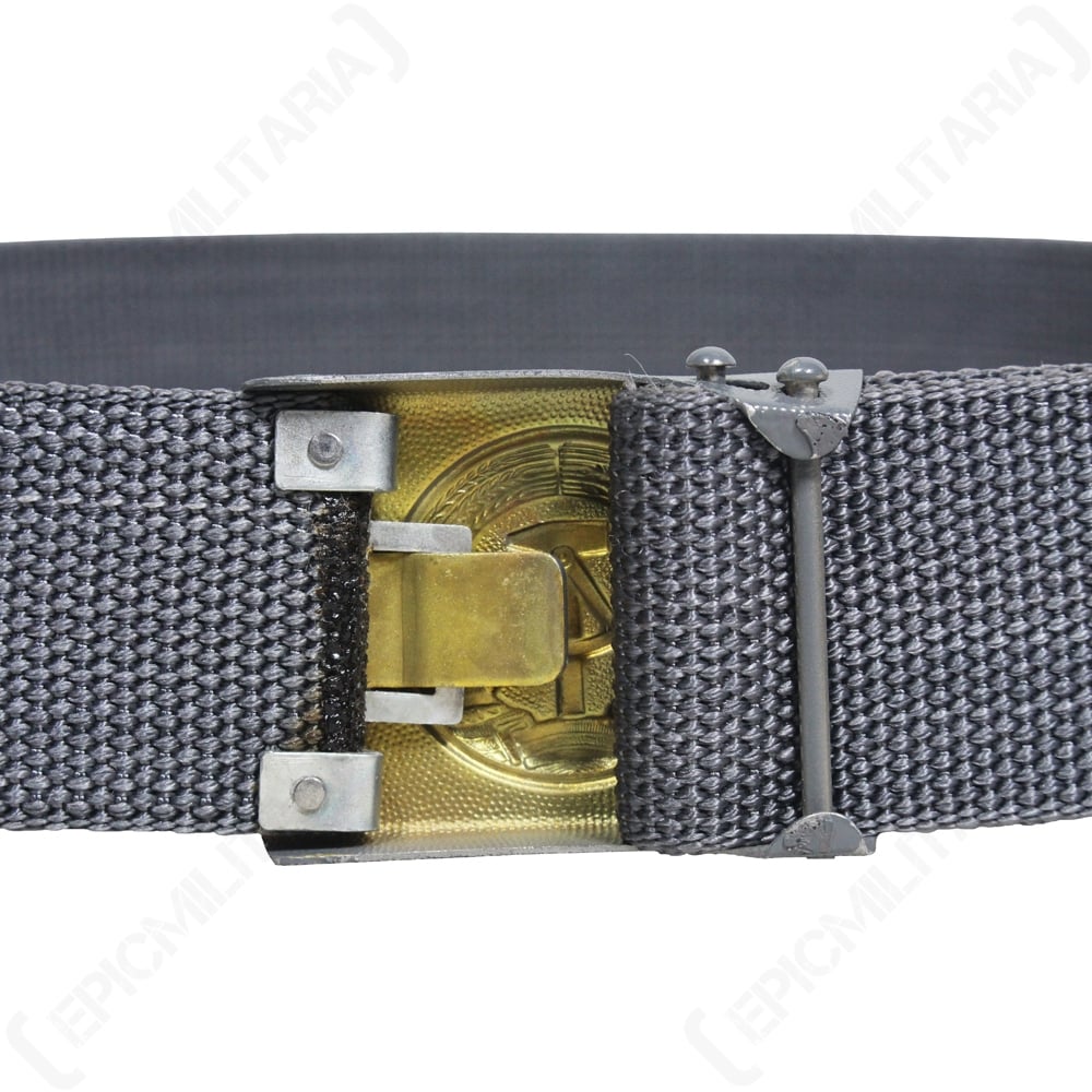 Reverse view of the East German military belt buckle showing the internal brass-toned adjustment mechanism.