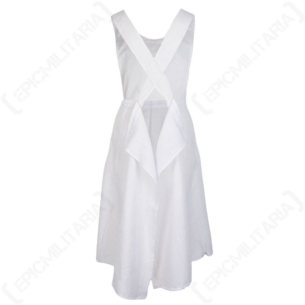 Rear view of the cotton Red Cross nurse apron showing the crisscross shoulder straps for historical reenactment authenticity.