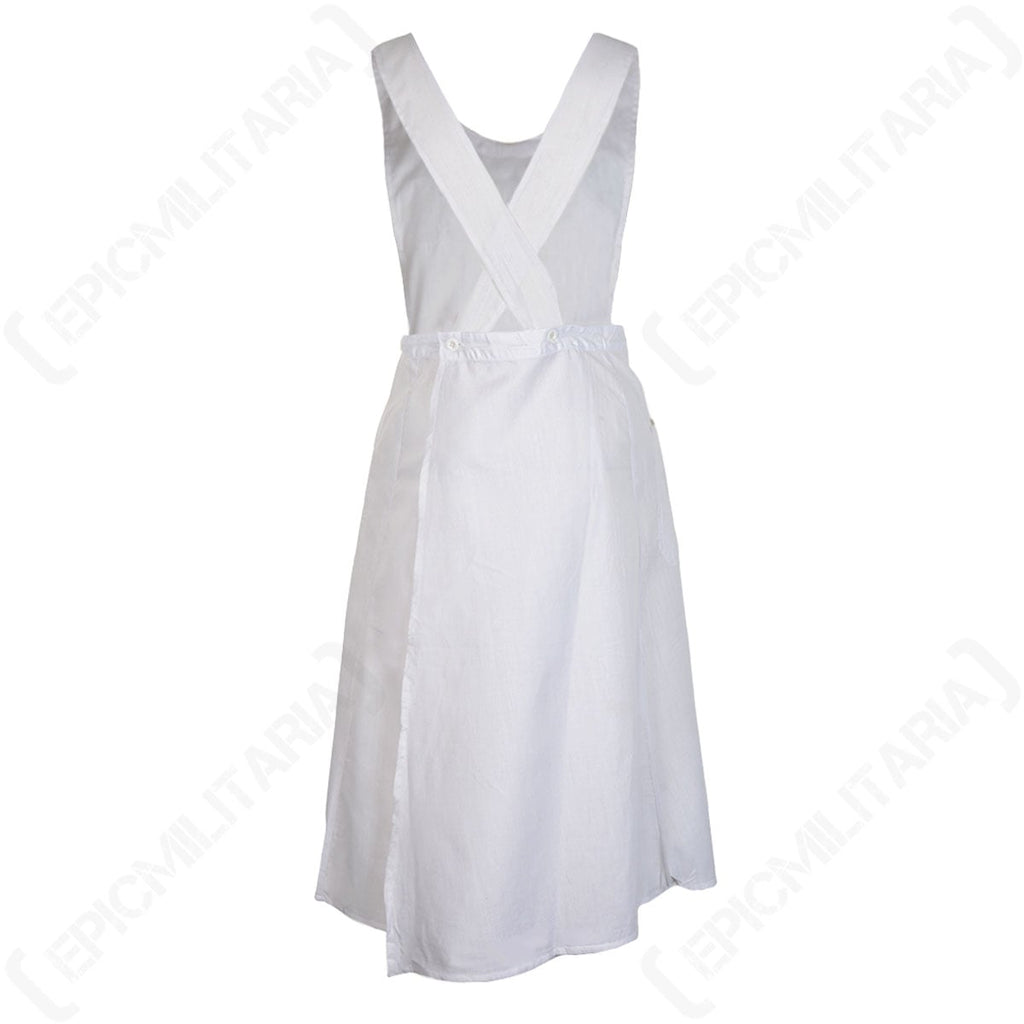 Back of the white Red Cross nurse apron highlighting the adjustable buttonhole straps for a customizable fit.