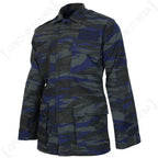 Angled side view of Hellenic Air Force blue lizard camouflage jacket showing elbow reinforcement patch and cuffs