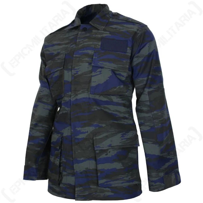 Angled side view of Hellenic Air Force blue lizard camouflage jacket showing elbow reinforcement patch and cuffs