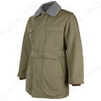 Three-quarter angle of the Czech M85 field parka, showcasing the adjustable waist belt and the olive green finish of this Cold War surplus coat.