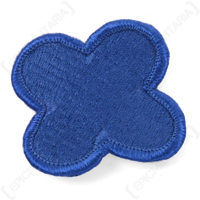 Close up detail of embroidered blue thread pattern on US 88th Infantry Division patch