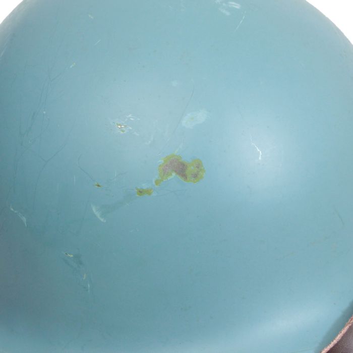 Close up detail of paint finish and steel construction on Belgian UN M1 helmet