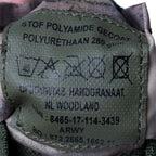 Close-up of the internal green label showing the manufacturer ARWY, official Dutch nomenclature, and the NATO Stock Number 8465-17-114-3439.