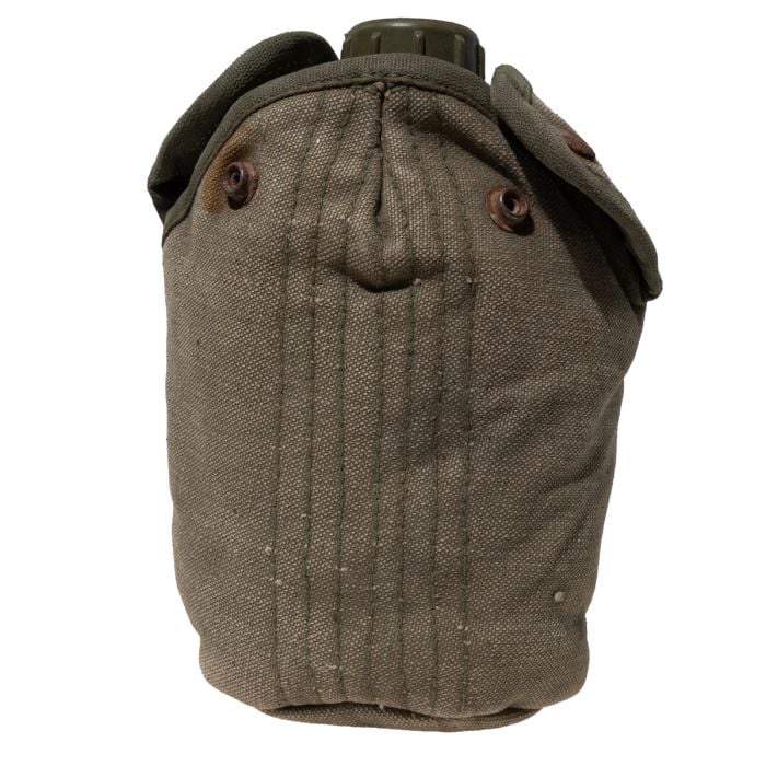 Close up of the Greek Army M56 canteen inside its heavy duty canvas cover with snap buttons