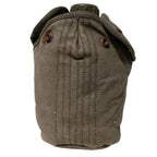 Close up of the Greek Army M56 canteen inside its heavy duty canvas cover with snap buttons