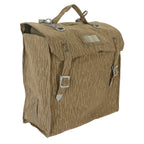 Side profile of an unissued East German NVA Strichtarn camo rucksack showing durable canvas and metal buckle closures.