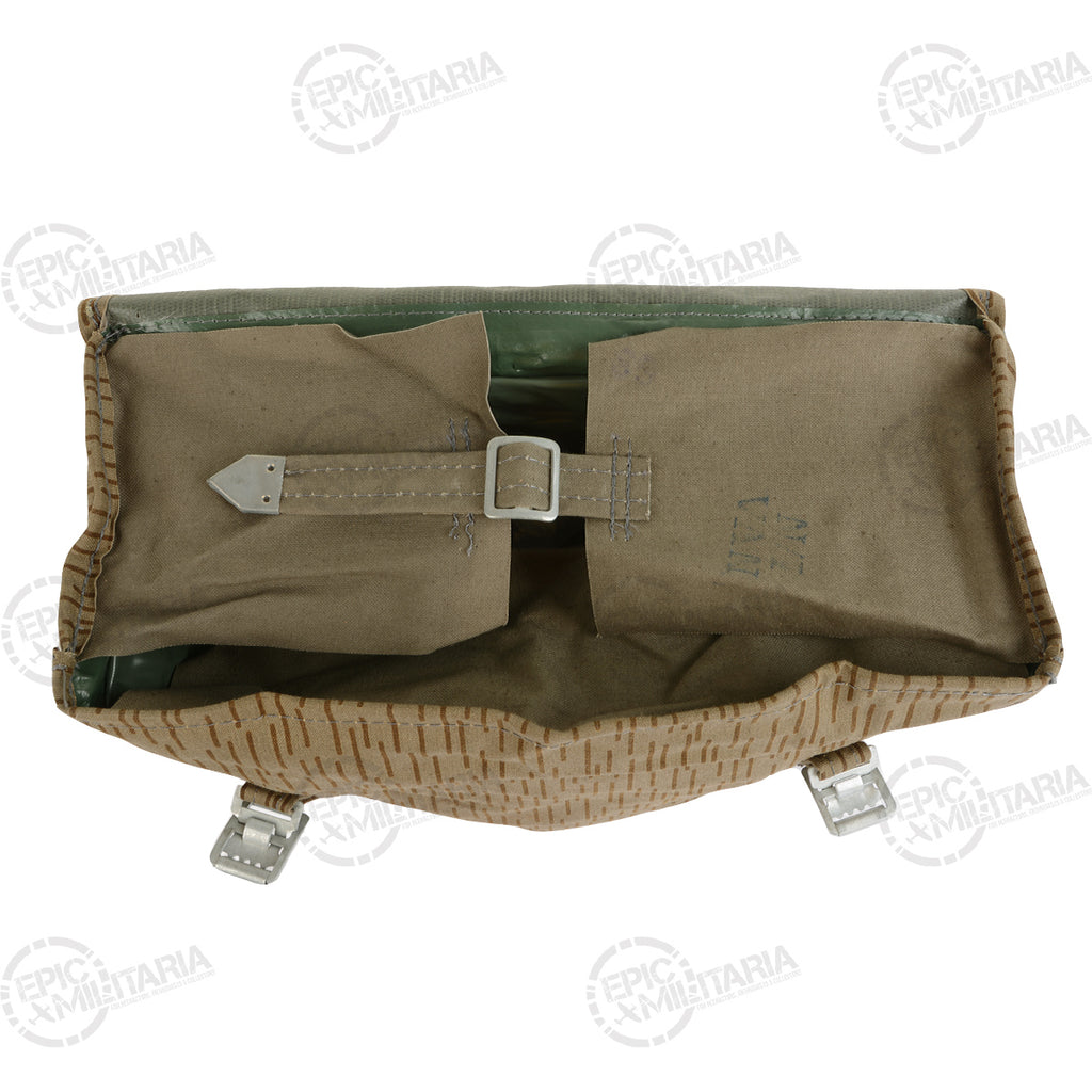 Top interior view of the East German Strichtarn rucksack showing the single large storage compartment and internal canvas flaps.