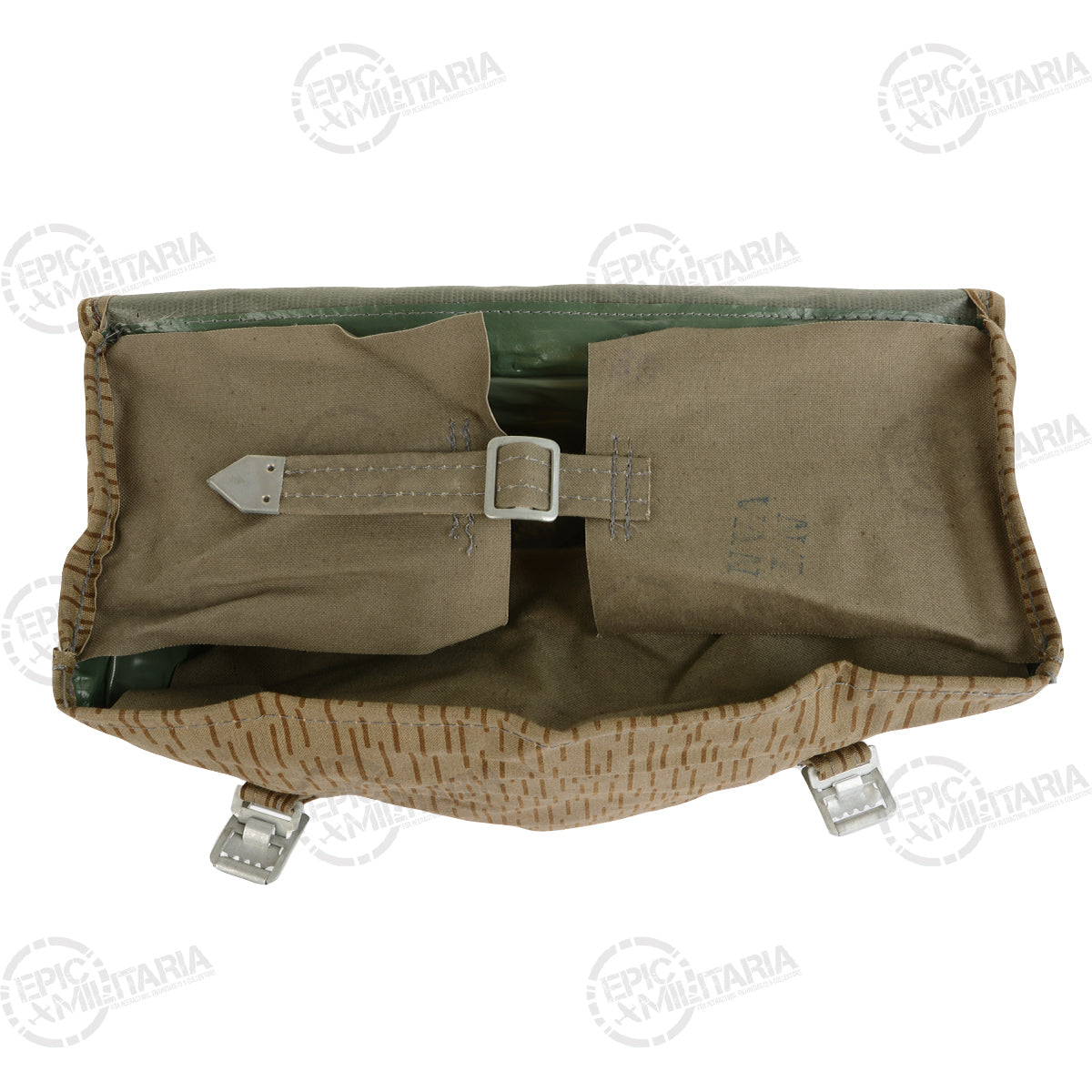 Top interior view of the East German Strichtarn rucksack showing the single large storage compartment and internal canvas flaps.
