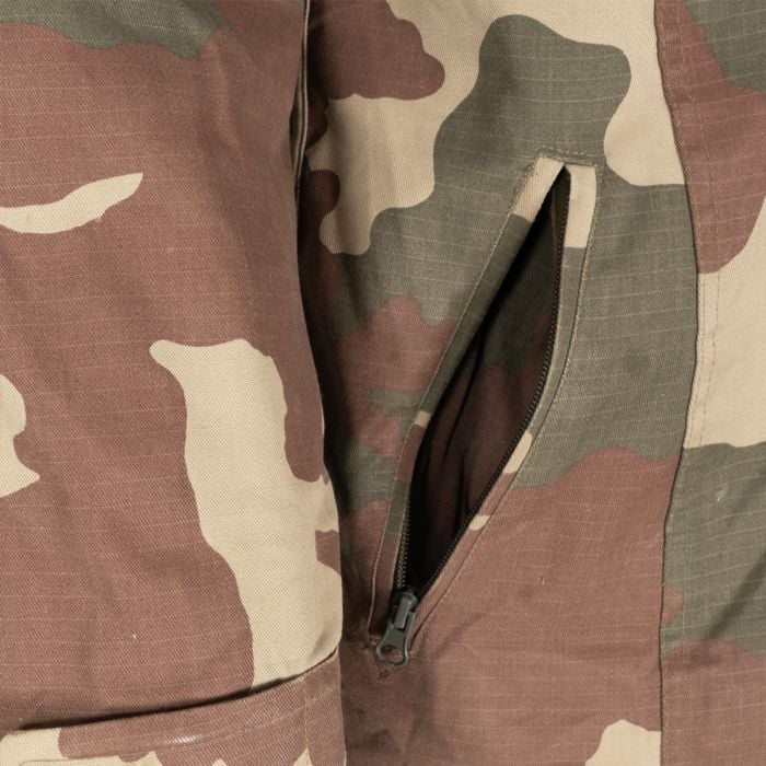 Detail of zippered stowed hood compartment on the collar of Turkish Parka