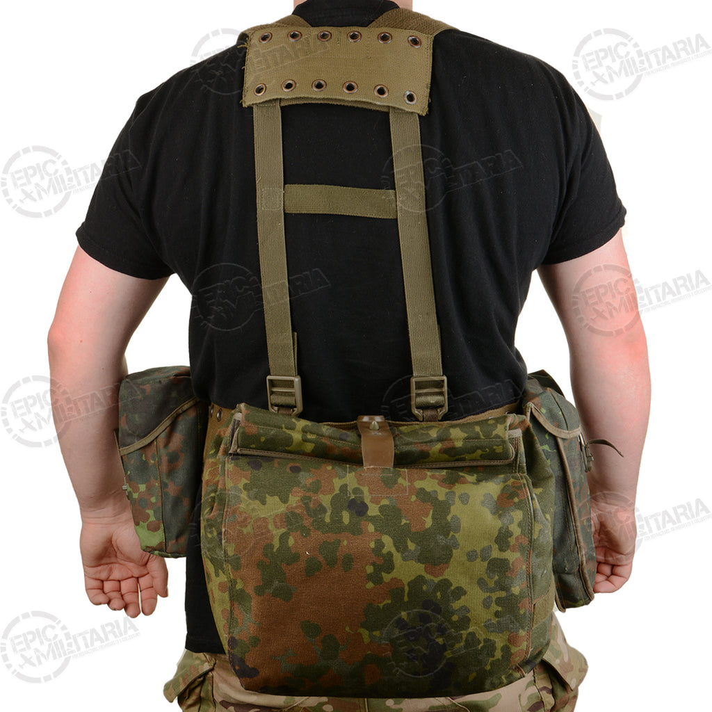 Back view of the German Bundeswehr harness set on a person, showing the modular pouch arrangement and tactical shoulder yoke.