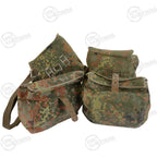 Two German Army Flecktarn roll-top gas mask bags showing their modular attachment clips and durable camouflaged nylon fabric.