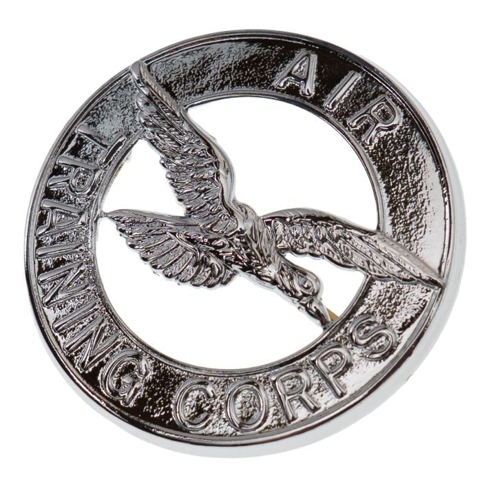 Angled front view of the shiny silver-toned ATC beret badge highlighting the raised detailing