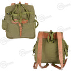 Comparison view showing the front of the olive canvas military rucksack and the rear with thick leather straps.