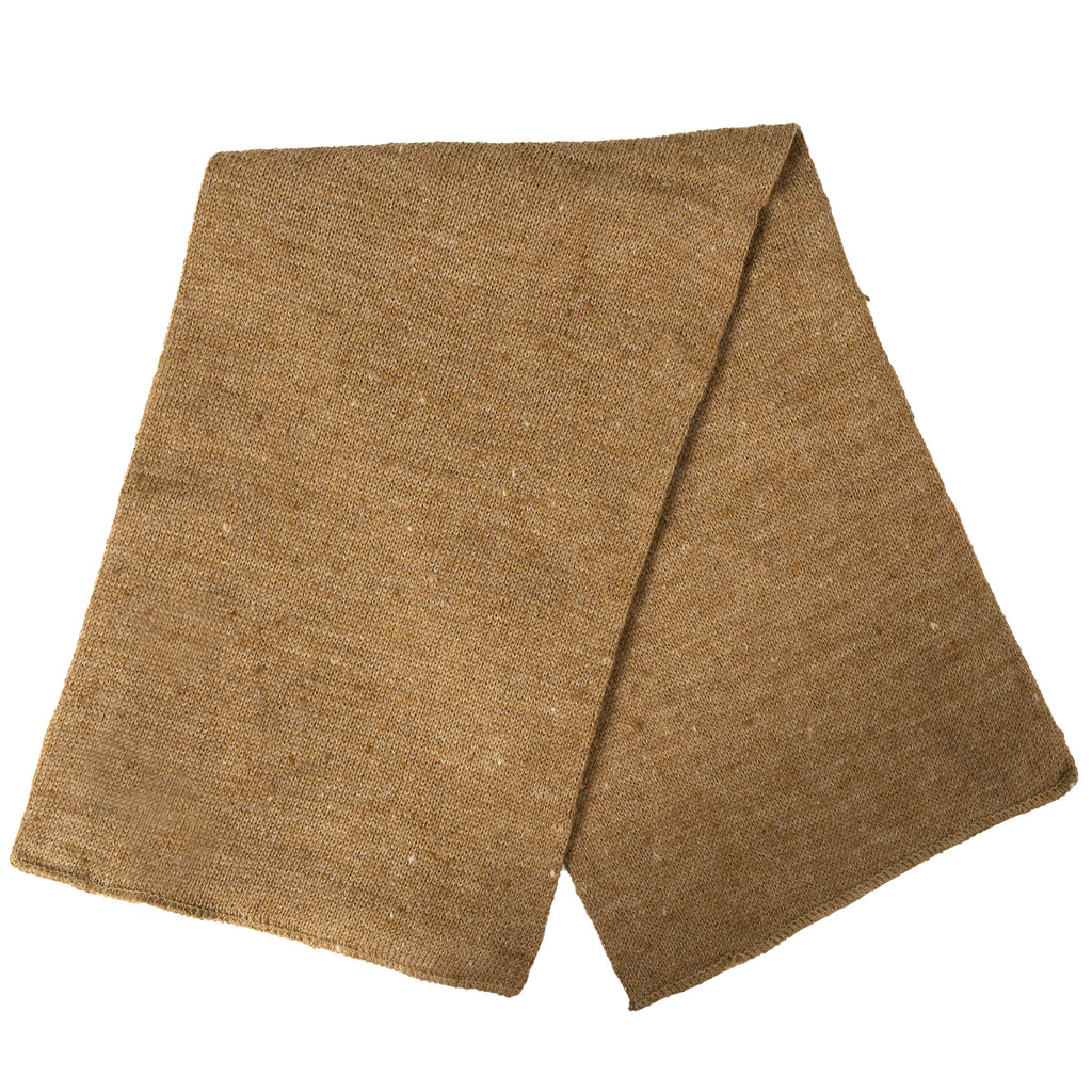 The versatile British Army cap comforter laid flat, demonstrating its long, seamless woollen tube design.