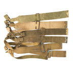 Stack of multiple genuine 37 Pattern L-straps exhibiting color variations from khaki to olive drab, suitable for military reenactment.