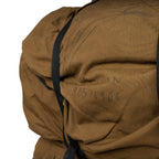 Detailed view of authentic handwritten soldier markings on the Nutria Brown Cordura nylon fabric of a vintage SADF Pattern 83 backpack.