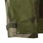 Detail view of the adjustable cuff on the sleeve of the M90 field shirt with secure hook and loop fasteners.