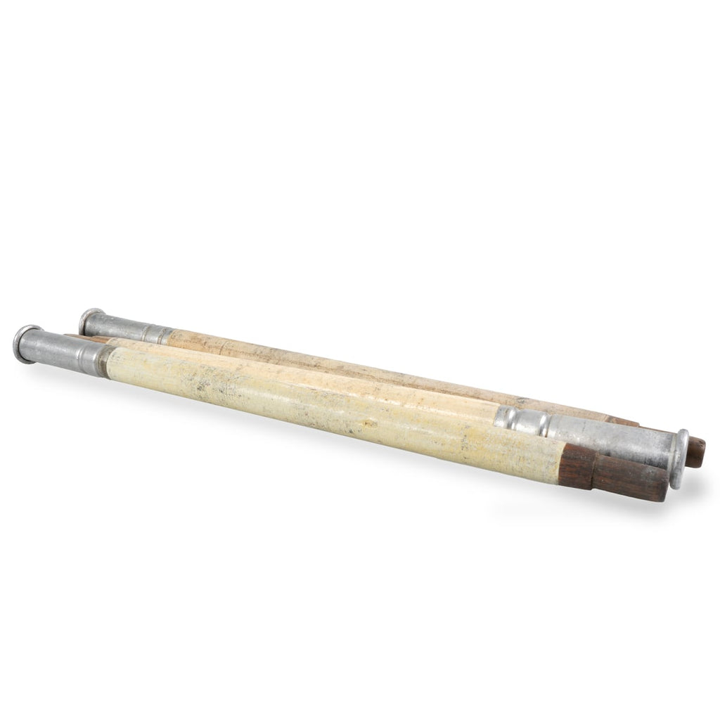 Three sectional wooden tent poles with metal end caps from the WW2 Swiss Army Zeltbahn kit, bundled together for storage.